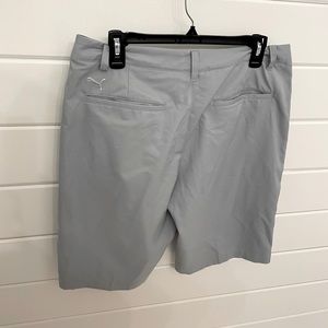Lightweight men’s Puma shorts.  Gray, waist size 32.   Rarely worn !!